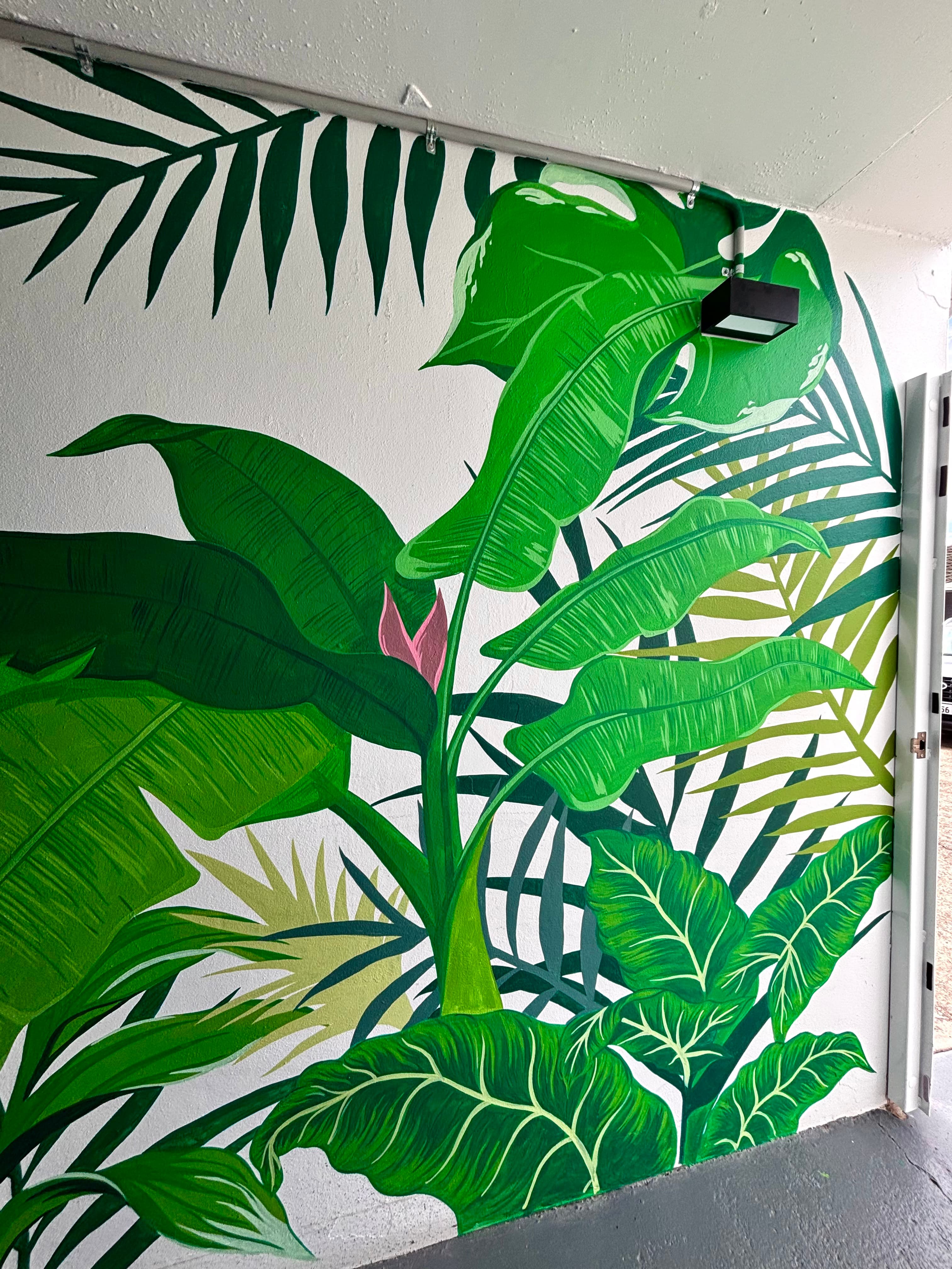 Fran painting a mural